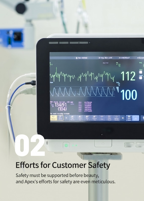 Patient monitoring system screen and safety commitment text at APEX Plastic Surgery